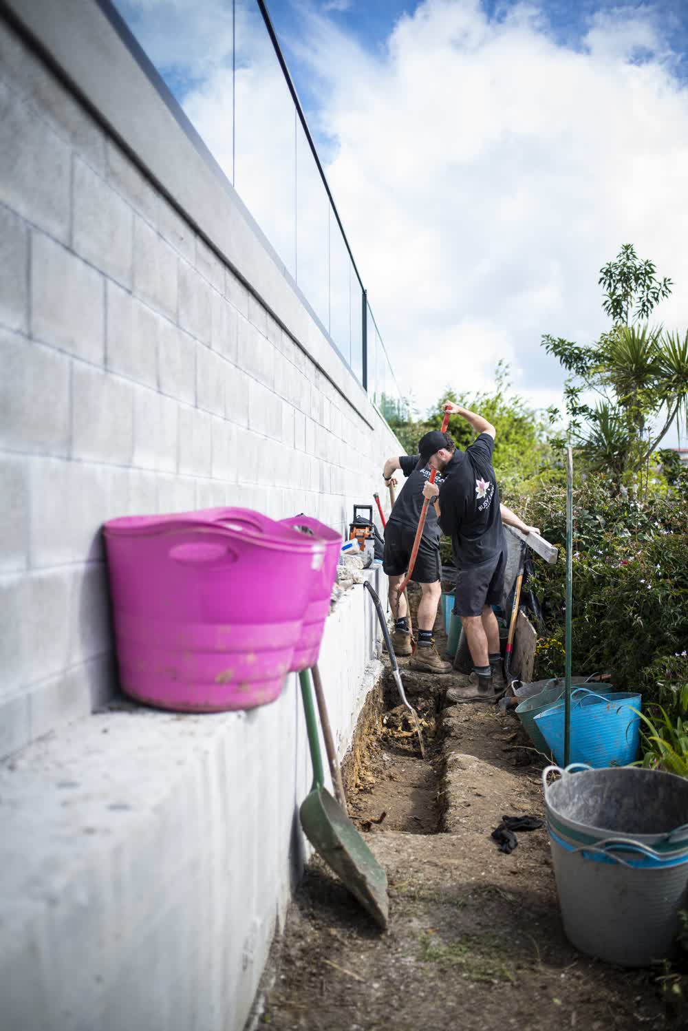 Team digging a trench for a new project